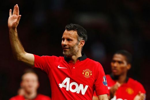 Giggs waves to the Old Trafford crowd after his last appearance for United