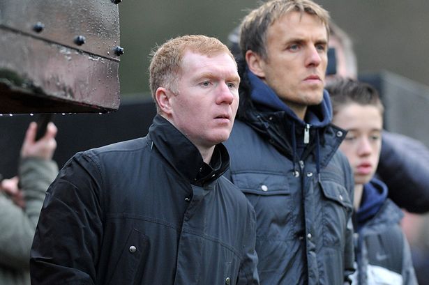Paul Scholes and Phil Neville in the Salford City dug out during the season